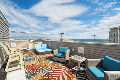 Welcome to Rooftop Tide! The private rooftop deck offers breathtaking sunrise, ocean views, and outdoor seating for morning coffee!