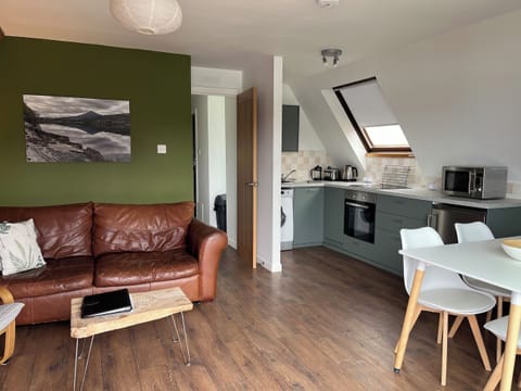 Open plan living space | Schiehallion - Kylesku Lodges, Kylesku, near Lairg