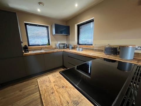 Kitchen area | White Cairn - Kylesku Lodges, Kylesku, near Lairg