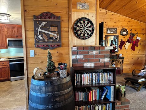 Living room and bar area open to the kitchen.