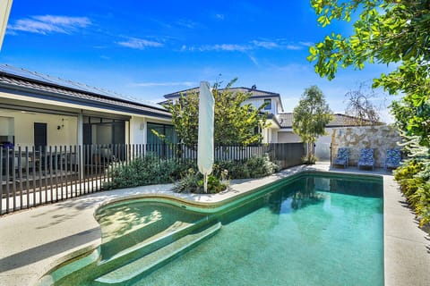 Relax in your own private swimming pool area