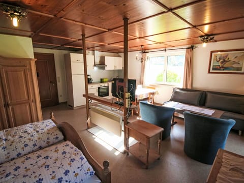 Furniture, Interior Design, Flooring, Wood, Floor, Ceiling, Room, Table, Lighting, Chair