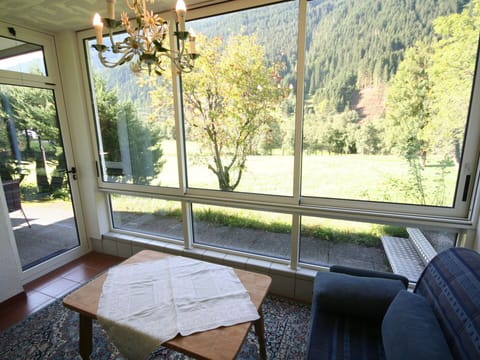 Furniture, Interior Design, Floor, Chair, Glass, Living Room, Room, Couch, Shade, Daylighting