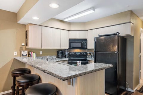 Sip morning coffee or grab a bite at the kitchen counter, seating 3