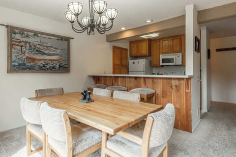 Dining area seats 6 w/ balcony access