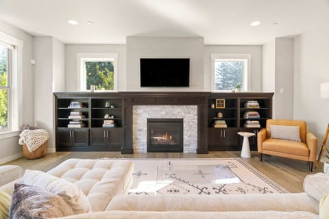 Spacious family living area with a large sectional, perfect for movie nights and relaxed evenings.