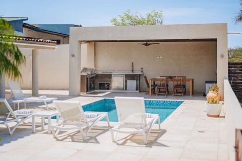 Relaxing paradise in Sol Y Luna: your perfect getaway with a poolside retreat and outdoor kitchen.