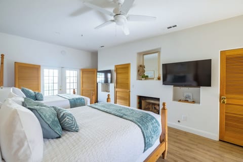 Two Queen Beds with 55 Inch TV's