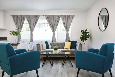 A stylish space with modern accents and cozy seating