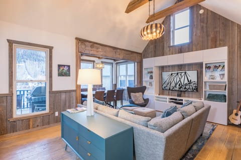 Cathedral living room with barnwood accents