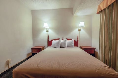 Sink into a spacious king bed for deep, restful sleep.