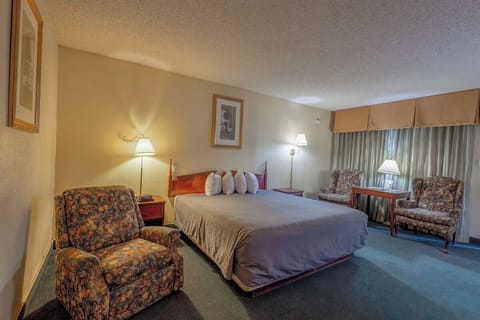 Sink into plush pillows and relax beside the softly lit window.