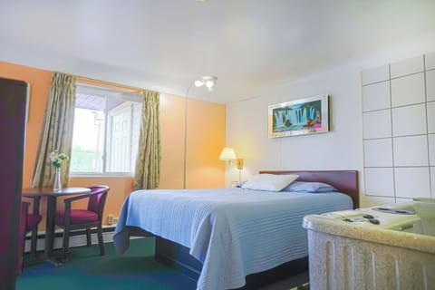 Unit with Queen Bed and Jetted Tub