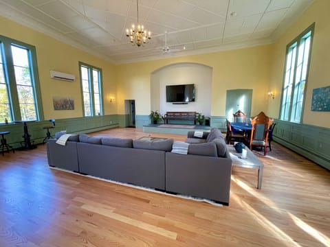 1200 square foot great room with seating for many and an 85 inch TV!