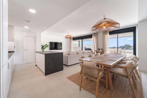 Bright lounge area with comfortable dining seating and natural light.