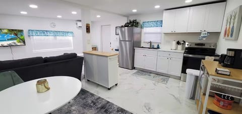 Main area - Kitchenette, Dining Table for 2, & Couch