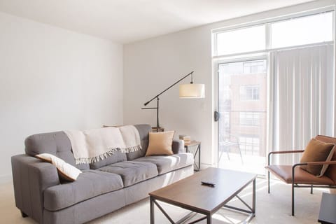 Spacious living room with private balcony