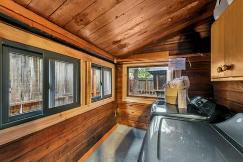 Cozy laundry nook with warm wood accents and natural light