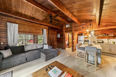 Cozy open-concept living and kitchen with rustic charm