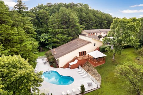 Soak up the Smoky Mountain views from this stunning aerial shot of your private pool oasis.