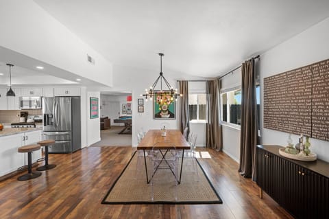 Gather for slow breakfasts or lively dinners—this spacious dining area sets the scene for connection and conversation.