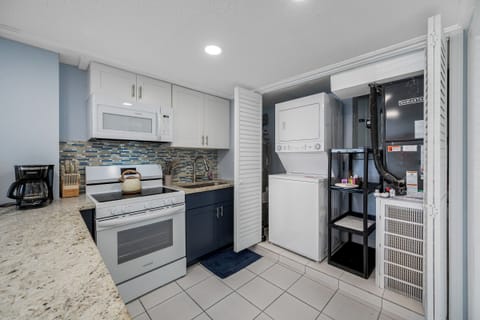 Large kitchen and laundry area