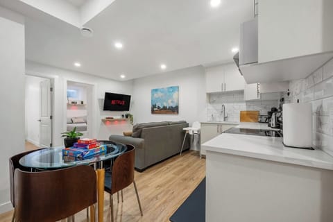 Open-plan living area with full kitchen and dining space for families