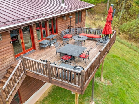 Step onto the spacious deck for peaceful views or gather around the fire pit under the stars.