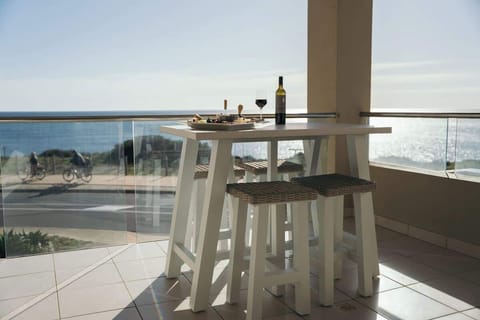 Large balcony with outdoor furniture