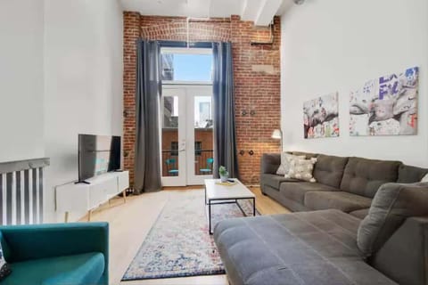 Living room with exposed brick