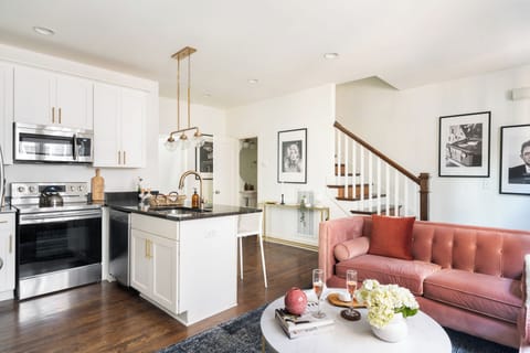 Oven, dishwasher and breakfast bar.