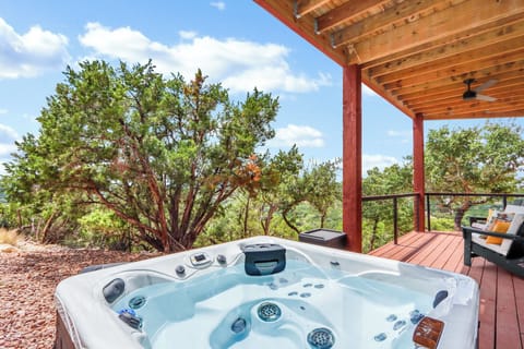 Private hot tub nestled into the Hill Country landscape