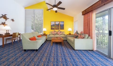 Gather on plush sofas and drift out to the lanai.