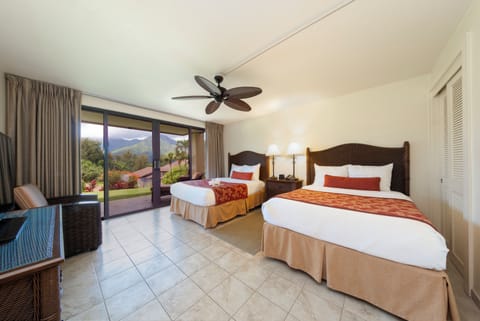 Unwind in crisp beds with garden-facing sliding doors.