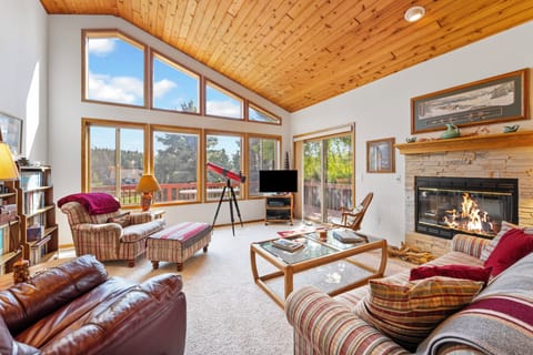 Warm up by the cozy fireplace after a rainy day | Interior