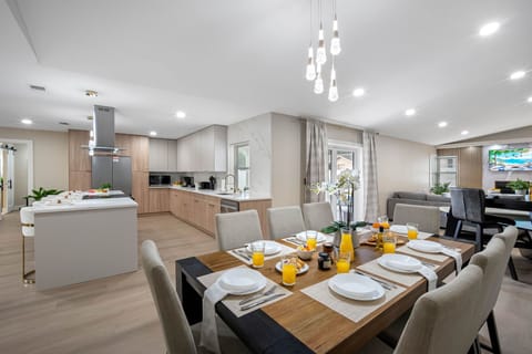 Chic lighting, sleek furniture, and minimalist décor create a refined yet cozy atmosphere.