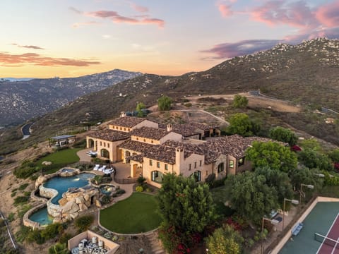 Mediterranean-inspired villa overlooking scenic landscapes.