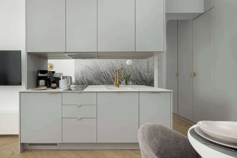 The kitchenette's practical layout maximizes space and functionality.