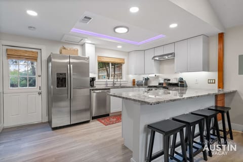 Whip up vacation favorites in this fully equipped kitchen, and bar seating for four.