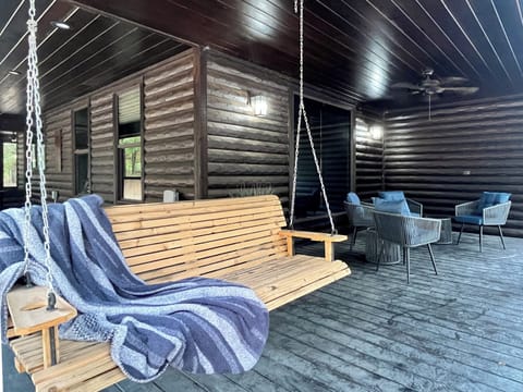 Sway into relaxation on the porch swing, wrapped in blankets and the fresh forest air.