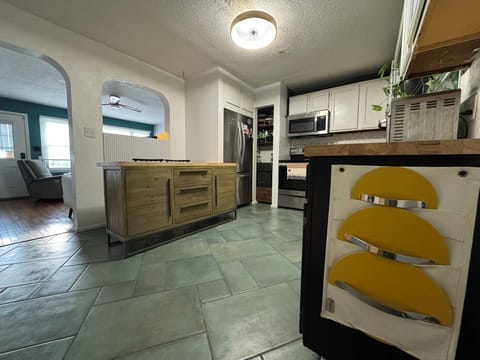 Pots and pans, dishes and all of your cutlery needs + cooking/condiment basics.