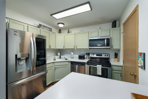 Enjoy a home-cooked meal in this fully equipped kitchen | Main Level