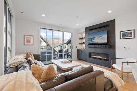 Living room: Main floor, gas fireplace, Smart TV, patio access