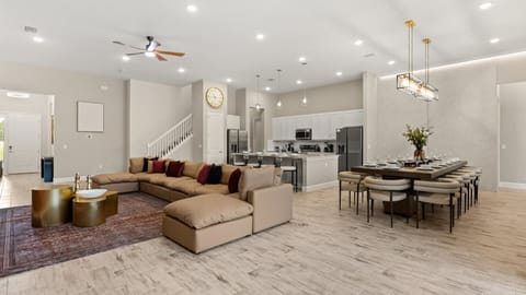 Contemporary living space – unwind and dine in a comfortable lounge and dining area filled with natural light