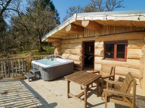 Private terrace with seating area and hot tub