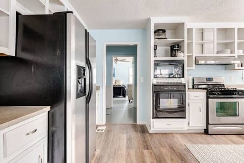 Spacious kitchen and dining area perfect for cooking and sharing meals together.
