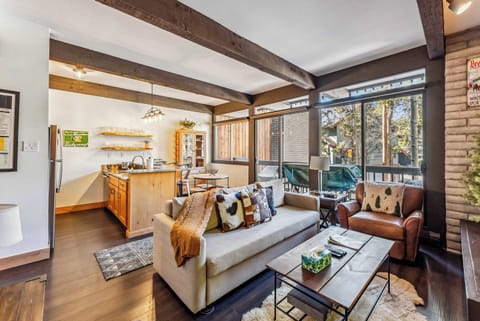 Main Living Space: Bright and open layout, living room, kitchen, and dining room 