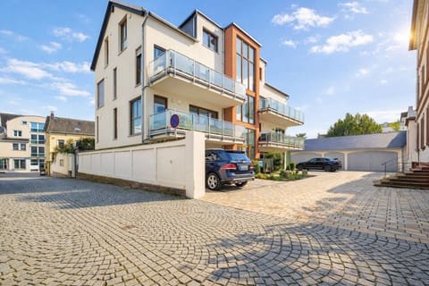 Quiet, modern residential complex in a central location with parking and convenient access.
