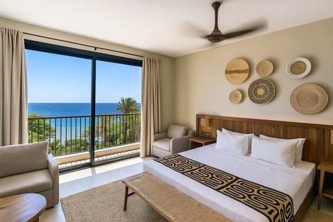 Wake to ocean breezes and sunshine in this serene king retreat.