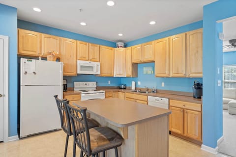 The open kitchen offers ample space & all the comforts of home​